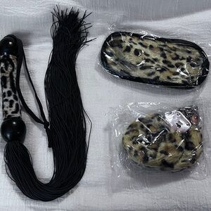 Adult Flogger kit.  Plush animal print.  Blindfold, cuffs and flogger.  New.